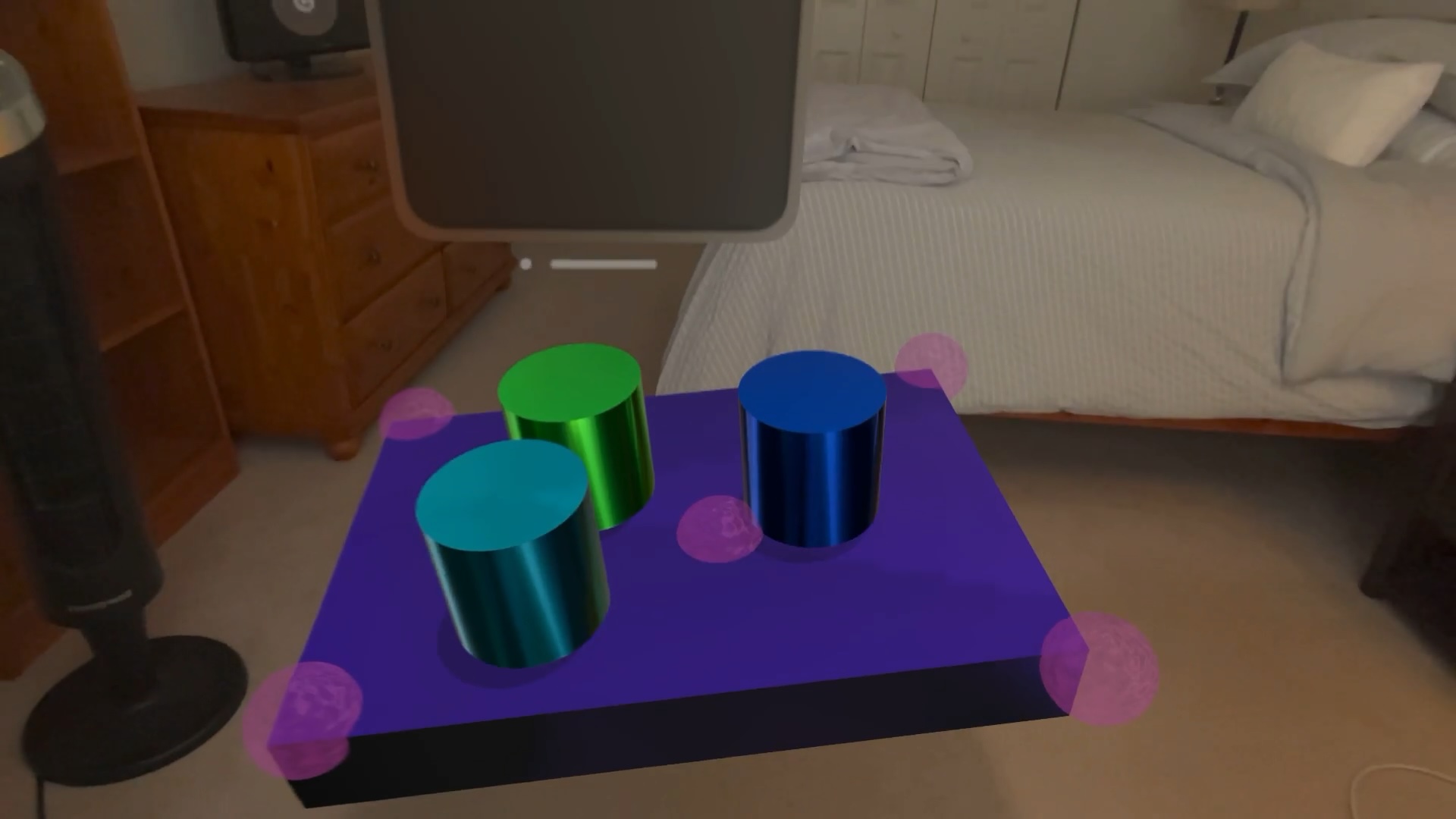 Some cylinders sitting on top of a platform suspended by hoverballs